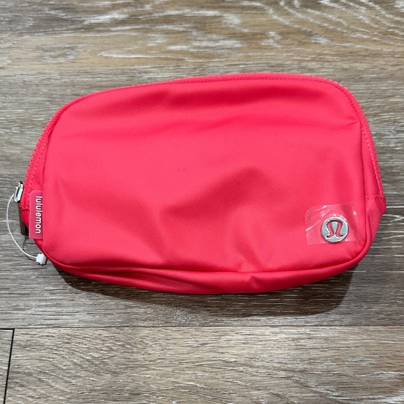 lululemon athletica Handbags - NWT! Lululemon Everywhere Belt Bag in Salmon Size Small